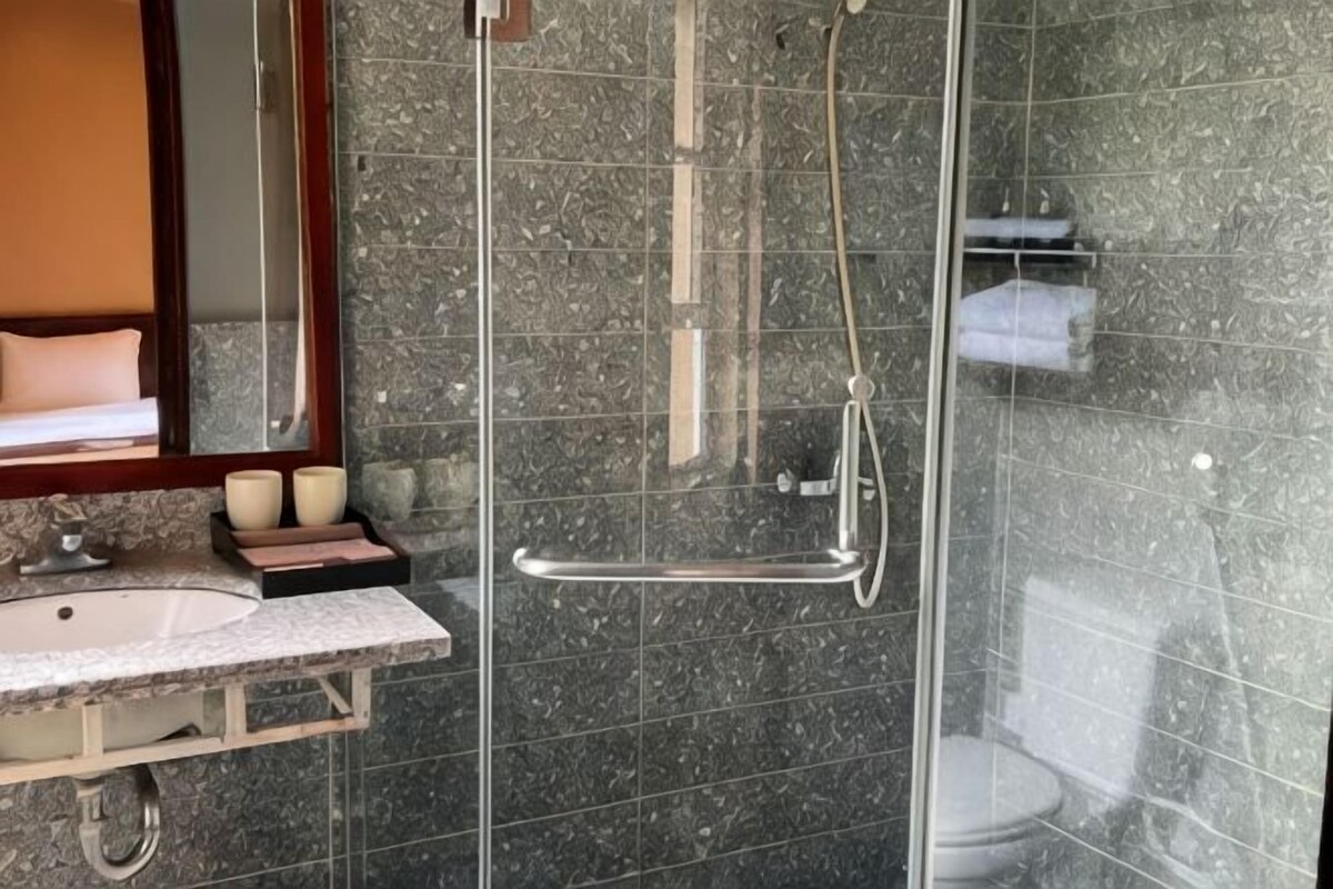 Bathroom | Free toiletries, hair dryer, slippers, bidet