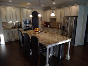 Fridge, microwave, oven, stovetop - MASTERS Rental in a designer home (Evans)