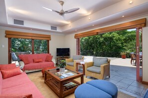 Luxury Villa, 4 Bedrooms, Non Smoking | Living area | 32-inch Smart TV with satellite channels, TV - San Lameer Villa Rentals 5916 (Southbroom)