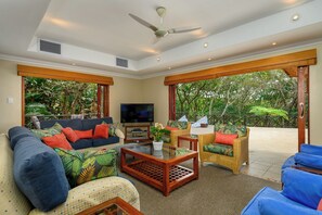 Luxury Villa, 5 Bedrooms | Living area | 32-inch Smart TV with satellite channels, TV - San Lameer Villa Rentals 11703 (Southbroom)