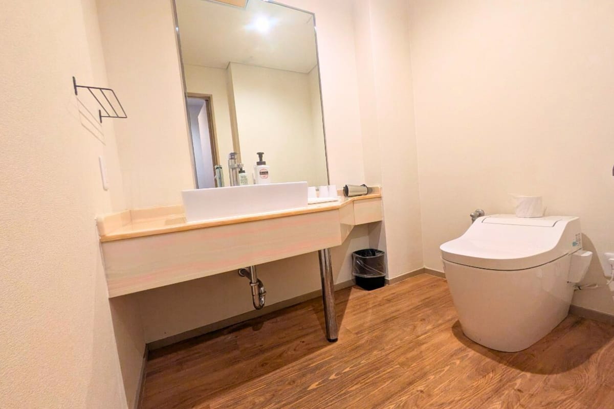 bathtub, deep-soaking bathtub, hair dryer, bathrobes