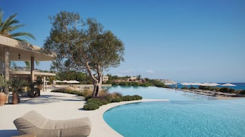 2 outdoor pools, pool umbrellas, pool loungers