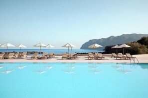 2 outdoor pools, pool umbrellas, pool loungers