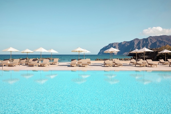 2 outdoor pools, pool umbrellas, sun loungers