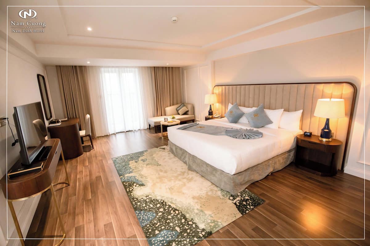 Deluxe Double Room Single Use, 1 King Bed | Minibar, in-room safe, individually furnished, desk