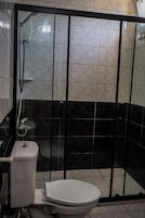 Shower, free toiletries, hair dryer, slippers