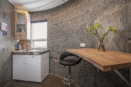 Studio | Private kitchenette | Fridge, stovetop, electric kettle, cookware/dishes/utensils. Klettar Tower Iceland