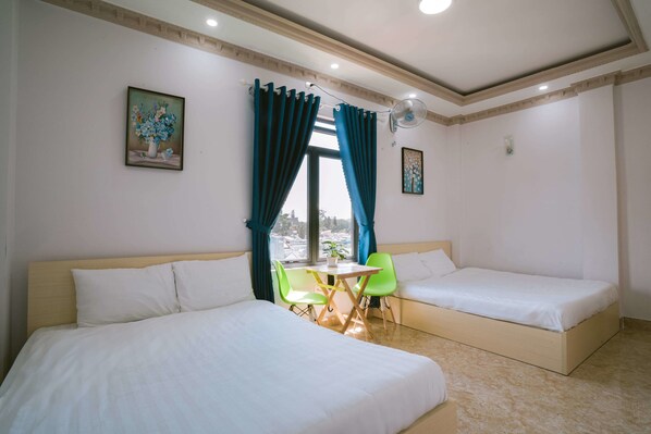 Phòng 4 dành cho gia đình, quang cảnh thành phố | Kiến trúc tòa nhà