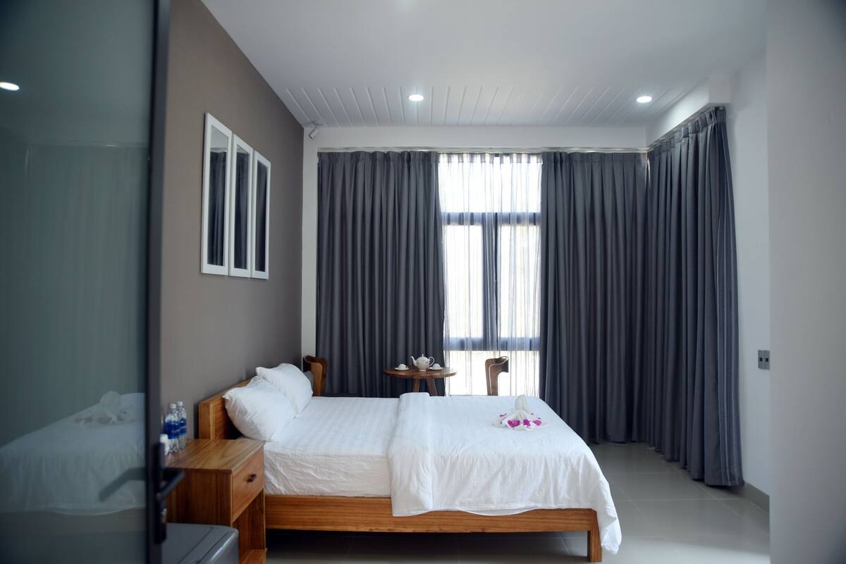 Deluxe Double Room, 1 King Bed, Beach View | Minibar, desk, free WiFi, bed sheets