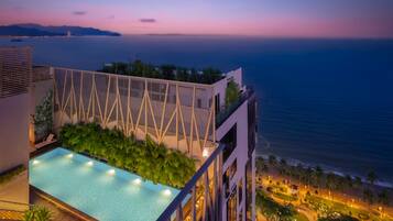 Outdoor pool, pool umbrellas, pool loungers