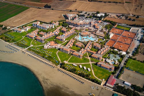 On the beach, sun-loungers, beach umbrellas, beach towels