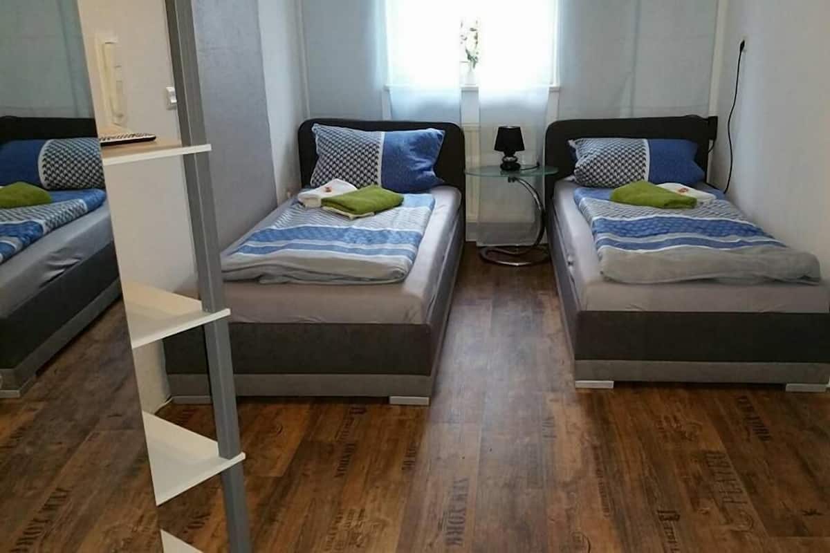 Desk, cots/infant beds, free WiFi, bed sheets