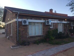 Front of property - evening/night - Namane Guest House (Ghanzi)
