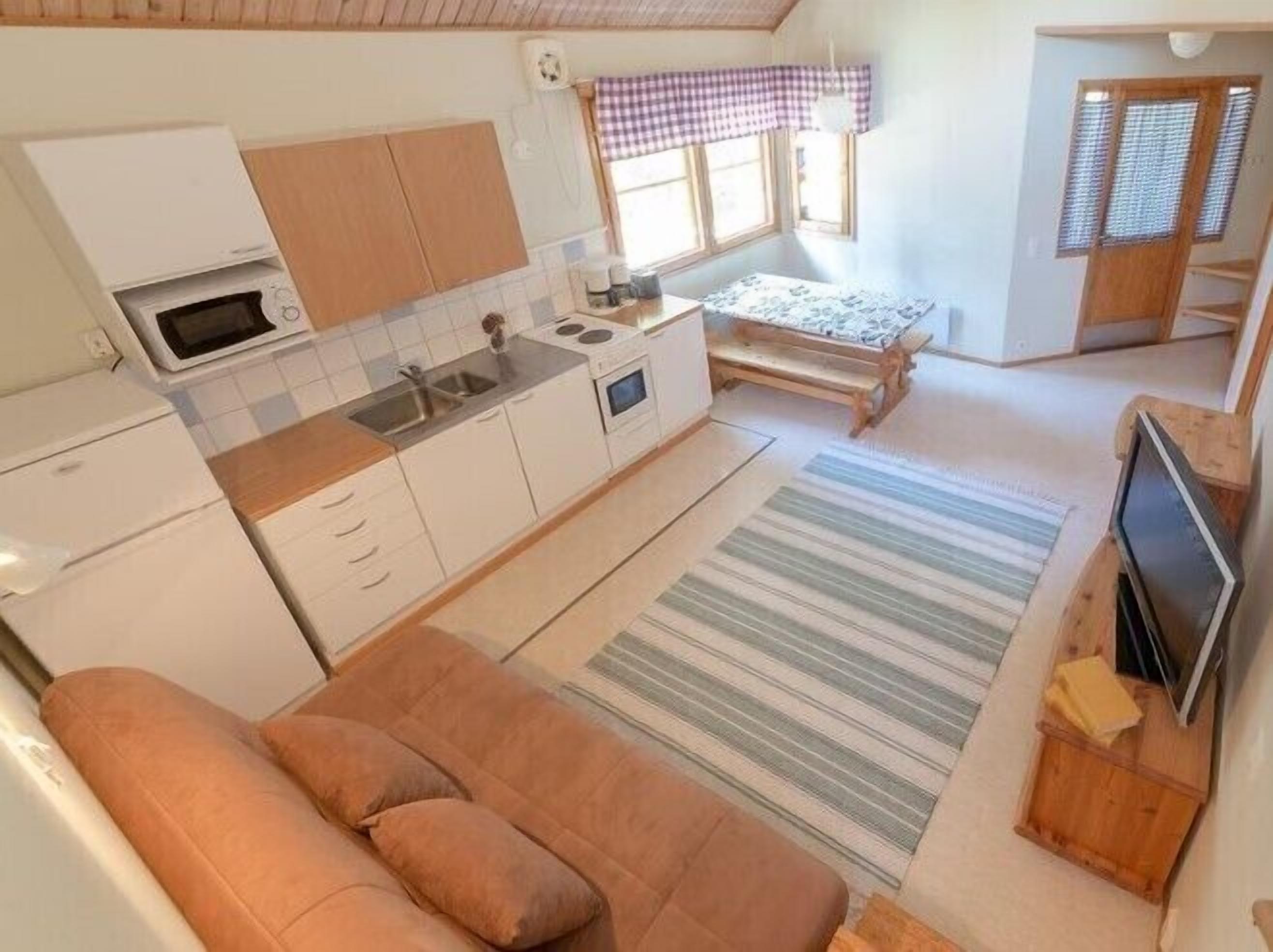 cottage multiple beds with sauna (5-6 adults)  | living area | tv