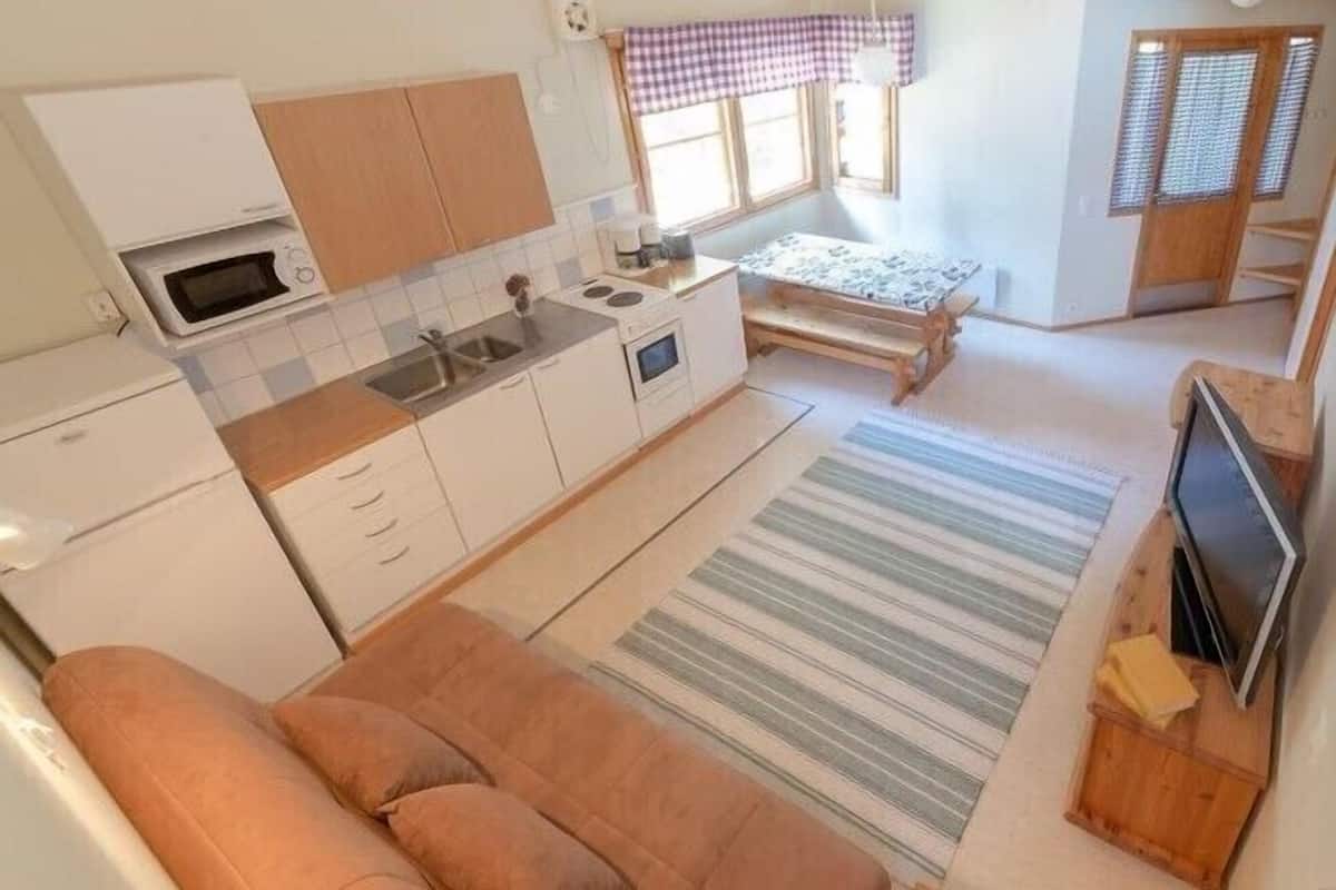 cottage multiple beds with sauna (5-6 adults)  | living area | tv