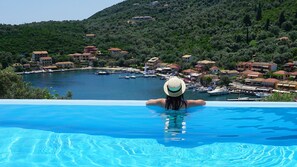 Seasonal outdoor pool, pool umbrellas, sun loungers