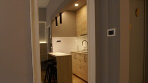 Comfort Studio (Cosy) | Living area | Flat-screen TV