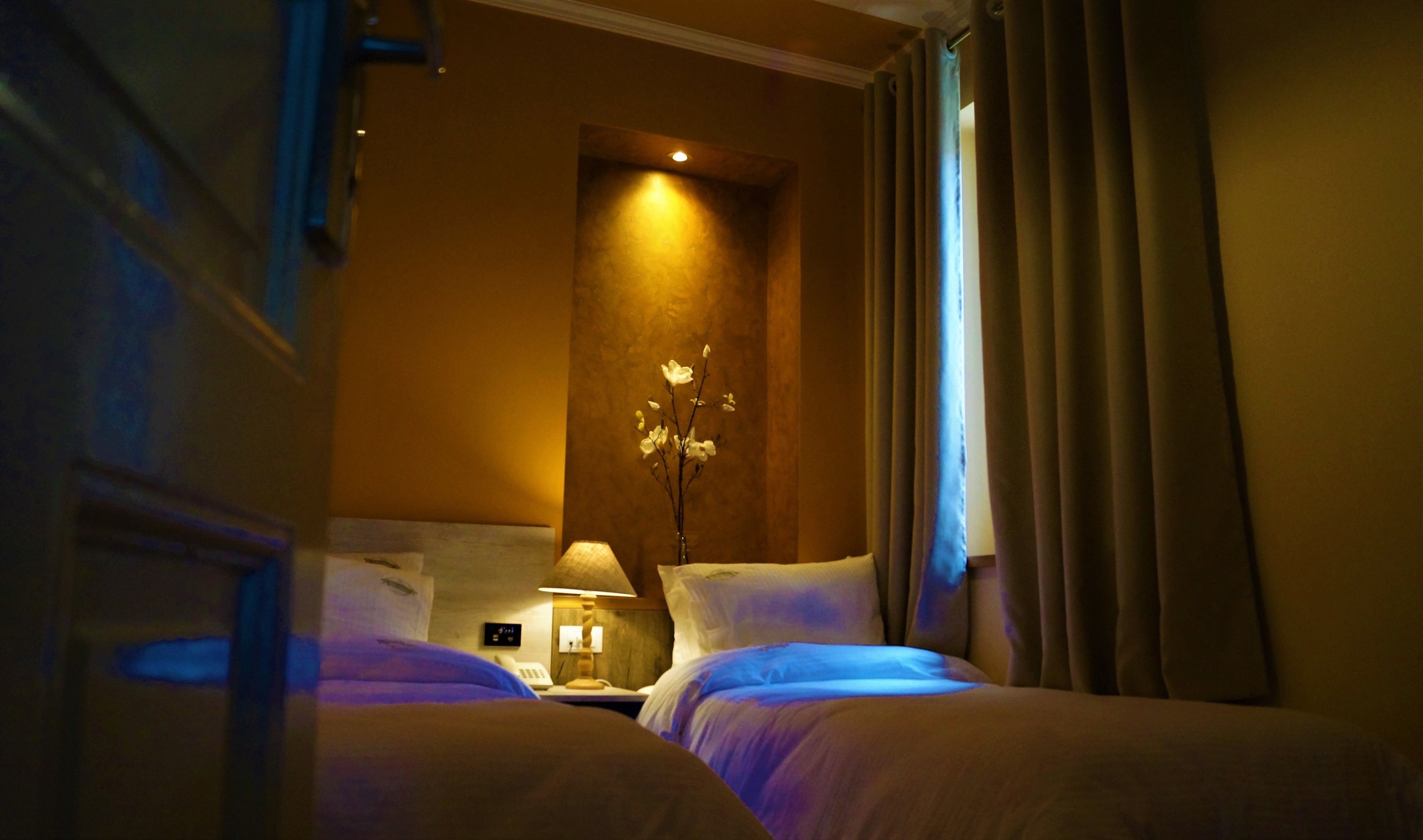 Down comforters, desk, soundproofing, rollaway beds