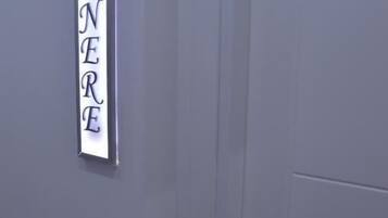 Shower, rainfall showerhead, designer toiletries, hair dryer