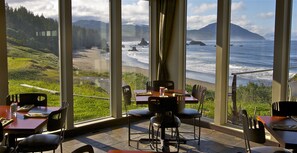 A restaurant with large windows offering ocean views, outdoor seating, and a casual dining atmosphere. - Battle Rock House-Port Orford - Spectacular Views
No Wind
Broadband Internet (Port Orford)