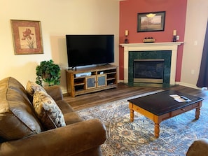 Condo, Multiple Beds (Whispering Pines 114) | Living room | Flat-screen TV, fireplace, DVD player
