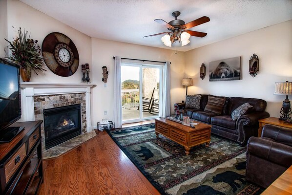 Condo, Multiple Beds (Whispering Pines 241) | Living room | Flat-screen TV, fireplace