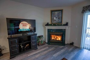 Condo, Multiple Beds (Whispering Pines 243) | Living area | Flat-screen TV, fireplace, DVD player