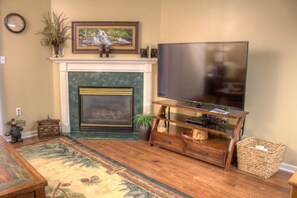 Condo, Multiple Beds (Whispering Pines 341) | Living area | Flat-screen TV, fireplace, DVD player - Whispering Pines 341 (Pigeon Forge)