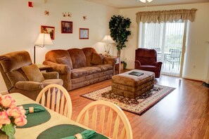 Condo, Multiple Beds (Whispering Pines 452) | Living area | Flat-screen TV, DVD player, books
