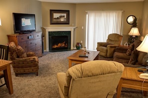 Condo, Multiple Beds (Whispering Pines 443) | Living area | Flat-screen TV, fireplace, DVD player - Whispering Pines 443 (Pigeon Forge)