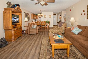 Condo, Multiple Beds (Whispering Pines 553) | Living area | Flat-screen TV, DVD player