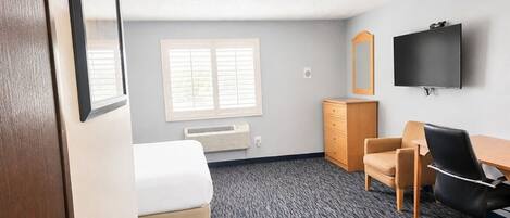 Studio King Bed | Living area | Flat-screen TV