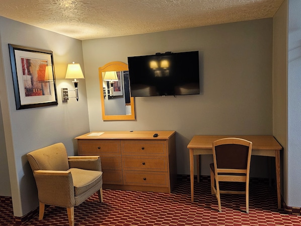 Studio Double Queen Bed | Living area | Flat-screen TV