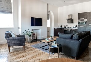 Deluxe One-Bedroom Apartment | Premium bedding, in-room safe, individually decorated