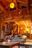 Log Cabin | Zona de estar | Una chimenea