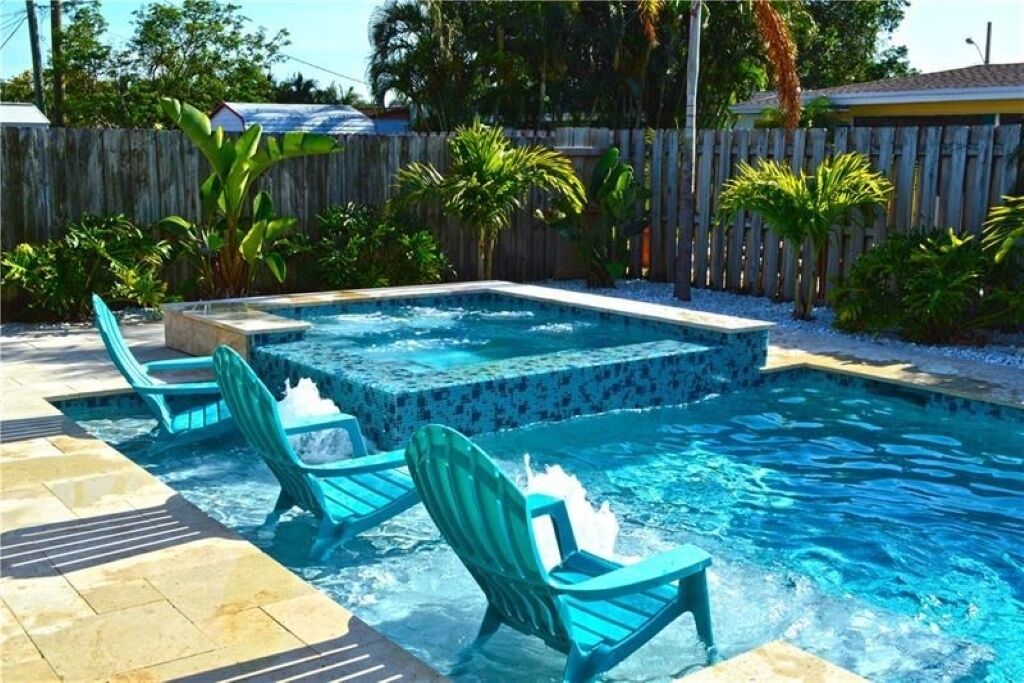 Luxurious private home with heated pool & spa . Five min to beach