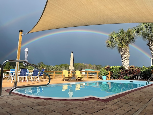 Outdoor pool, a heated pool - 3BR Waterfront Oasis w/ Private Solar Heated Pool and Spacious Deck (Holiday)
