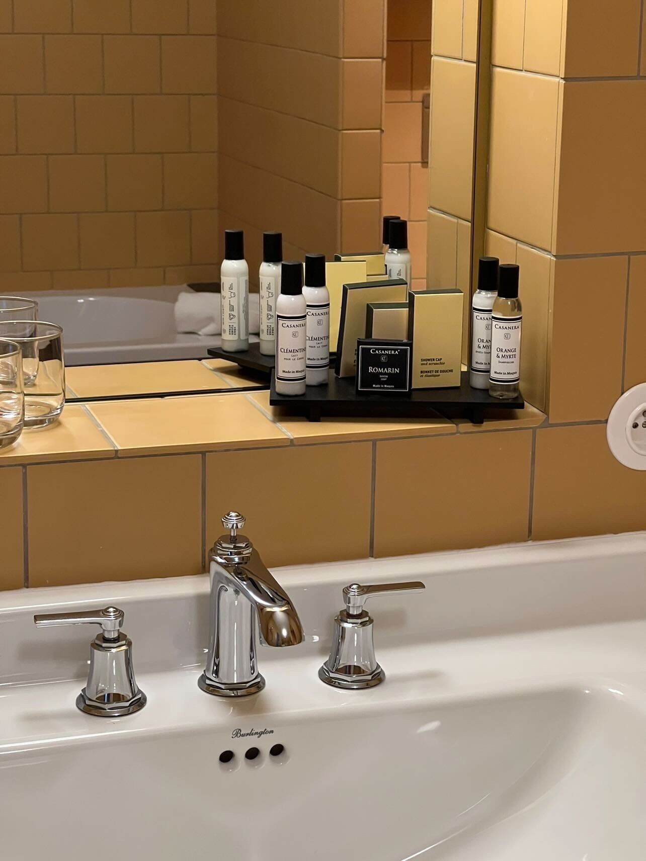 hair dryer, bathrobes, slippers, towels