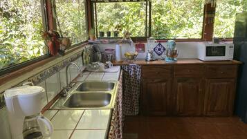 Full-sized fridge, microwave, stovetop, rice cooker