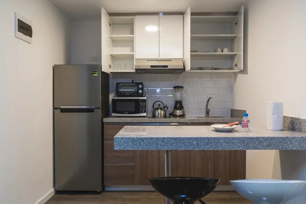 Apartment, 1 Bedroom | Private kitchen | Full-size fridge, microwave, oven, stovetop - Get relaxed in the heart of Miraflores - apt #D (Lima)