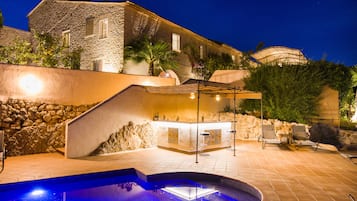 Outdoor pool, a heated pool, sun loungers