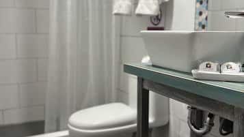 Separate bathtub and shower, free toiletries, hair dryer, towels