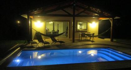 Holiday home with heated swimming pool