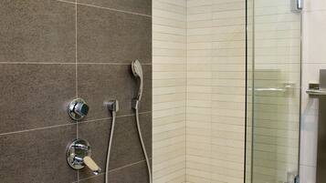 Bathtub, hair dryer, towels, soap