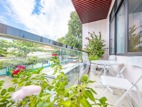 Deluxe Double Room Single Use | Balcony view