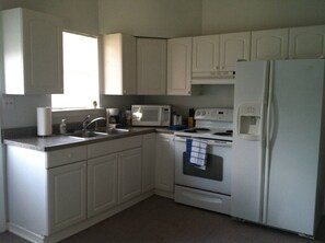 Fridge, microwave, oven, stovetop -   PET FRIENDLY WITH FRONT DOOR PARKING!  GROUND FLOOR WITH NO STEPS! (Orange Beach)