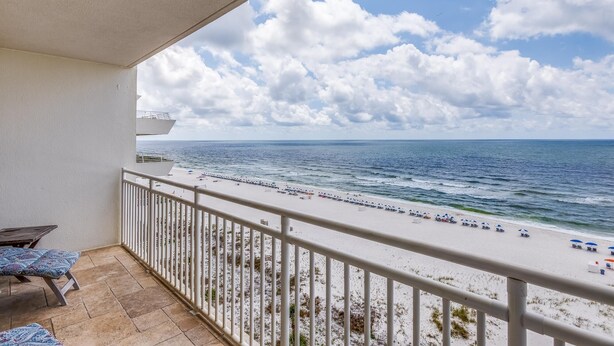 A balcony with a view of a beach and ocean. - Gulf Views! (Pensacola)