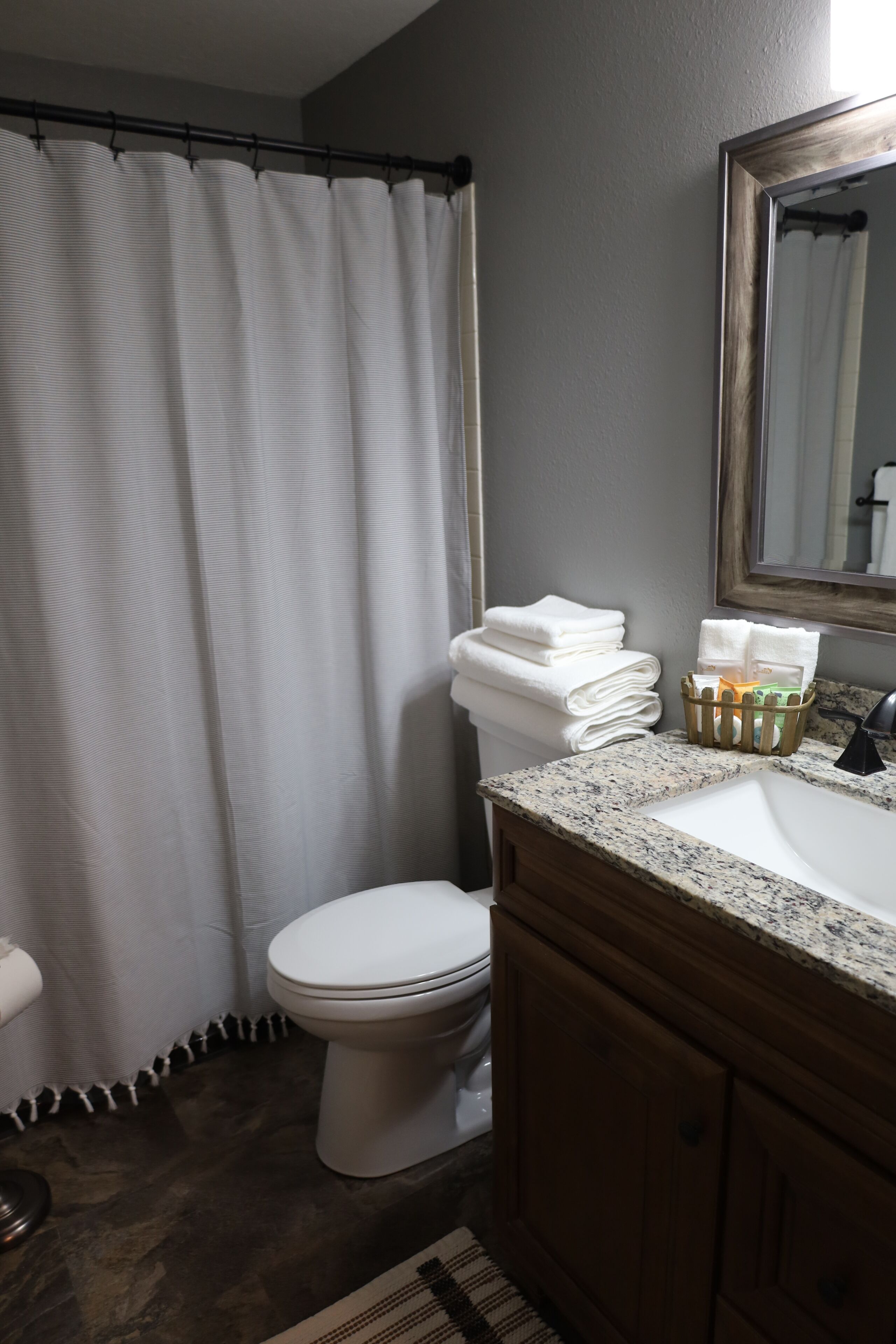 Combined shower/tub, hair dryer, towels, soap