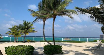 Caimán Kai, punto de ron; Pintoresco condominio frente al mar con hermosa playa privada