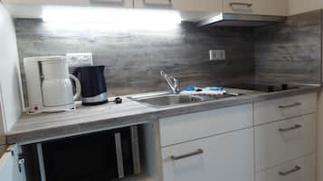 Fridge, microwave, coffee/tea maker, toaster